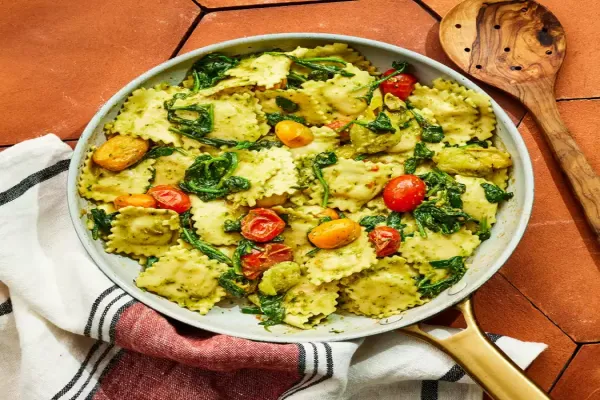 Pesto Ravioli with Spinach & Tomatoes