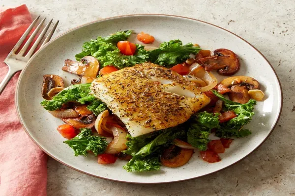 Herby Fish with Wilted Greens & Mushrooms