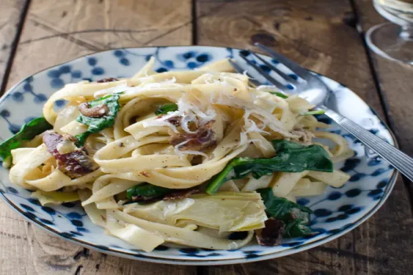 Creamy Chicken and Bacon Pasta with Artichoke Hearts and Spinach